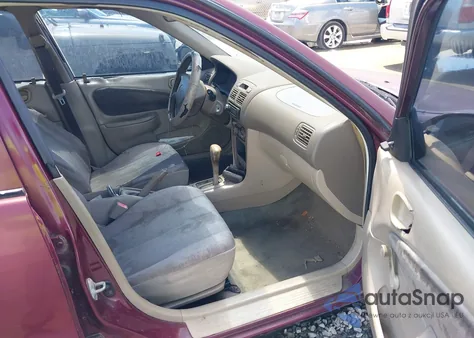 1998 Toyota Corolla Ve z USA, uszkodzony, nr VIN 1NXBR12E6WZ046183